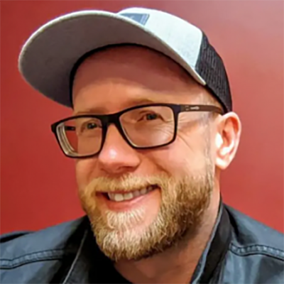 Клюн, Тревіс Джон